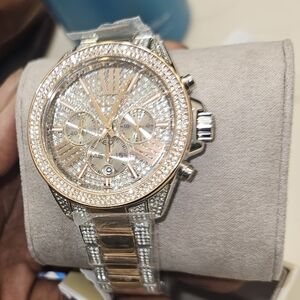 Brand New Michael Kors watch.   Rose gold and silver bezeled face and band. Rare